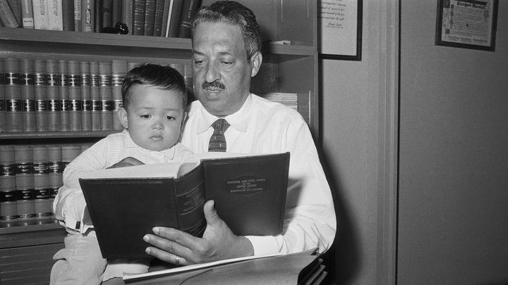 Thurgood Marshall, attorney for the National Association for the Advancement of Colored People, reads "Political and Civil ri